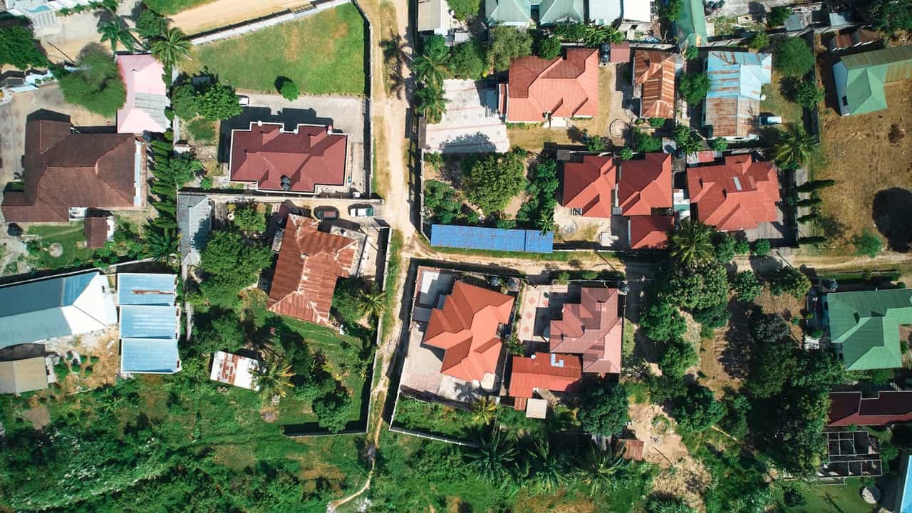 Starlink dish and solar panels on Nigerian residential rooftop