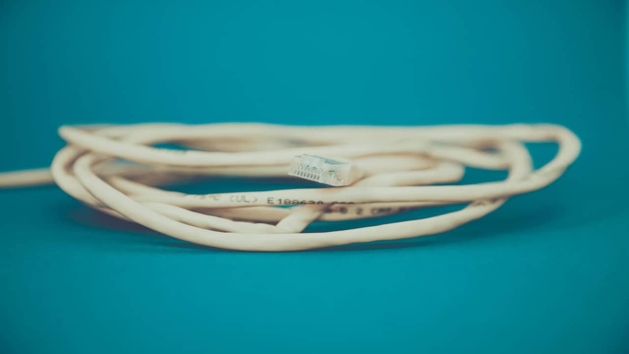 Starlink Ethernet adapter connected to home network rack in Nigeria