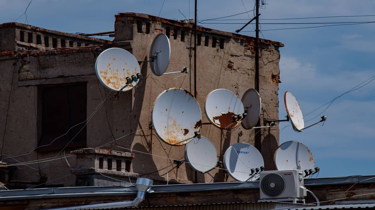 Next-generation Starlink dish hardware on Nigerian rooftop mount