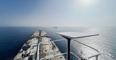 Starlink dish mounted on vessel deck in open water for boat installation